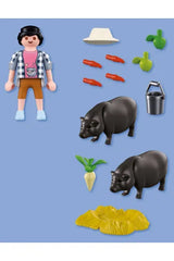 Agriculteur avec cochons vietnamiens - Country