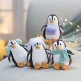 Pingouin en peluche assis
