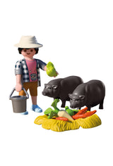 Agriculteur avec cochons vietnamiens - Country