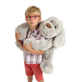 Flatoutou sitting dog